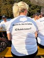 Rückenansicht der Laufshirts mit Leitspruch: Wusstest du, dass ein Lächeln 43 Muskeln trainiert?