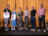 Fachtagung Depression Foto aller Teilnehmenden der Podiumsdiskussion auf der Bühne